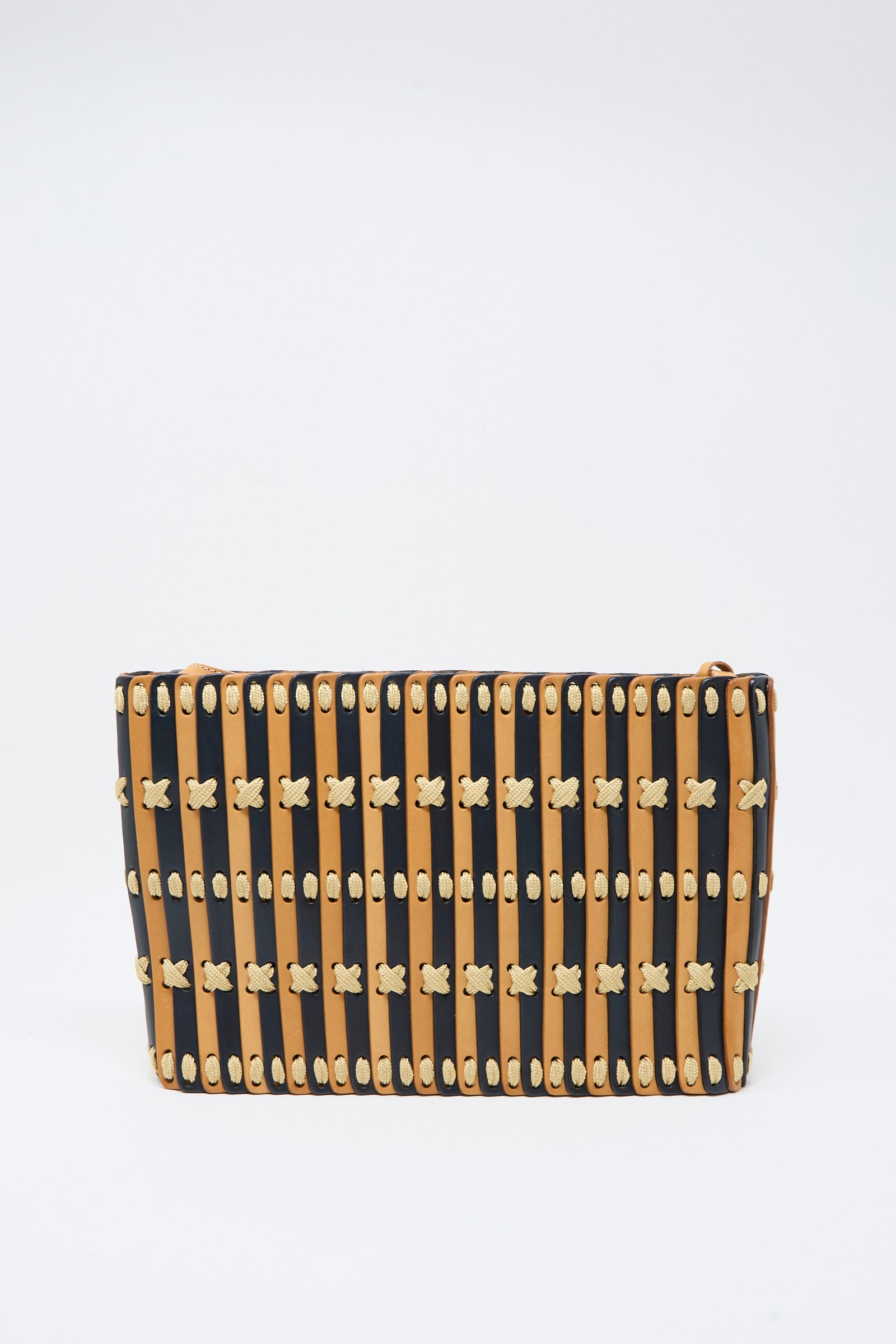Hatori's Leather Shoulder 60 Bag in Bi-Color with Tan Lacing is a rectangular handcrafted shoulder bag, showcasing alternating vertical black and tan wooden slats connected by small tan X-shaped links. The plain white background highlights the design, which is elevated with refined accents of vegetable tanned leather.