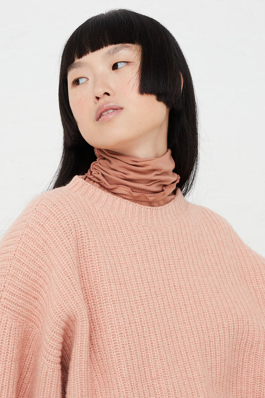 Omato Long sleeve Turtleneck Tee in Rose by Baserange for Oroboro Front Upclose with Sweater