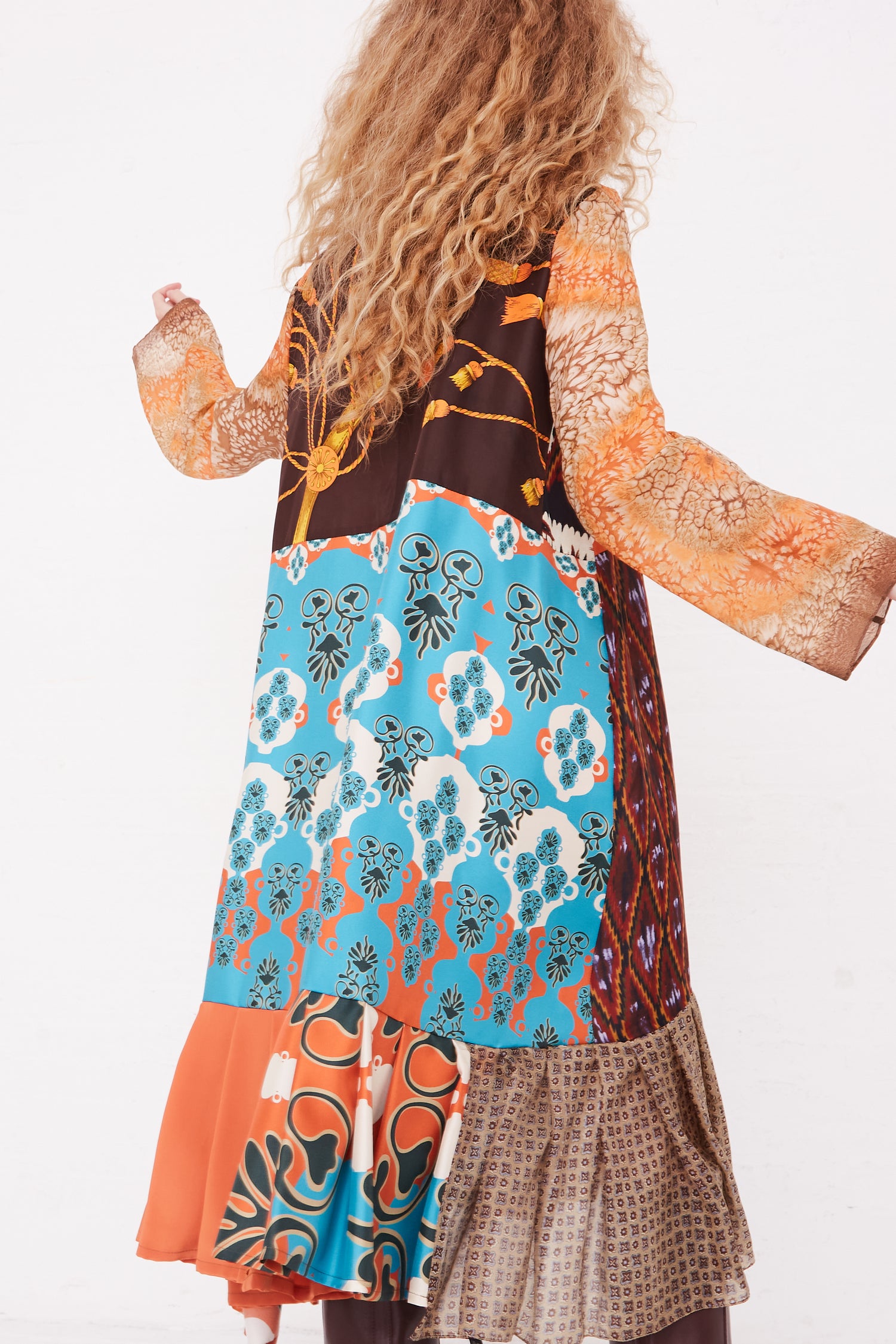 The back of a woman wearing a Bettina Bakdal Silk Vintage Scarves Lena Hannah Dress - M.