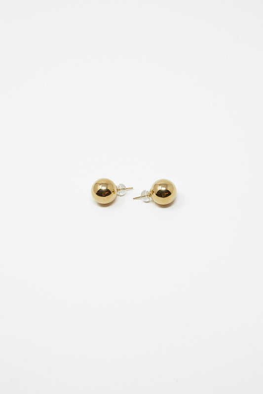 A pair of Kathleen Whitaker Sphere Stud Large 12mm Single Earrings in 14K Yellow Gold on a white background.