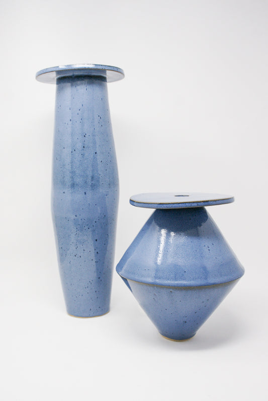 Two BZIPPY Tall Tube Saucers in Mottled Blue on a white surface.