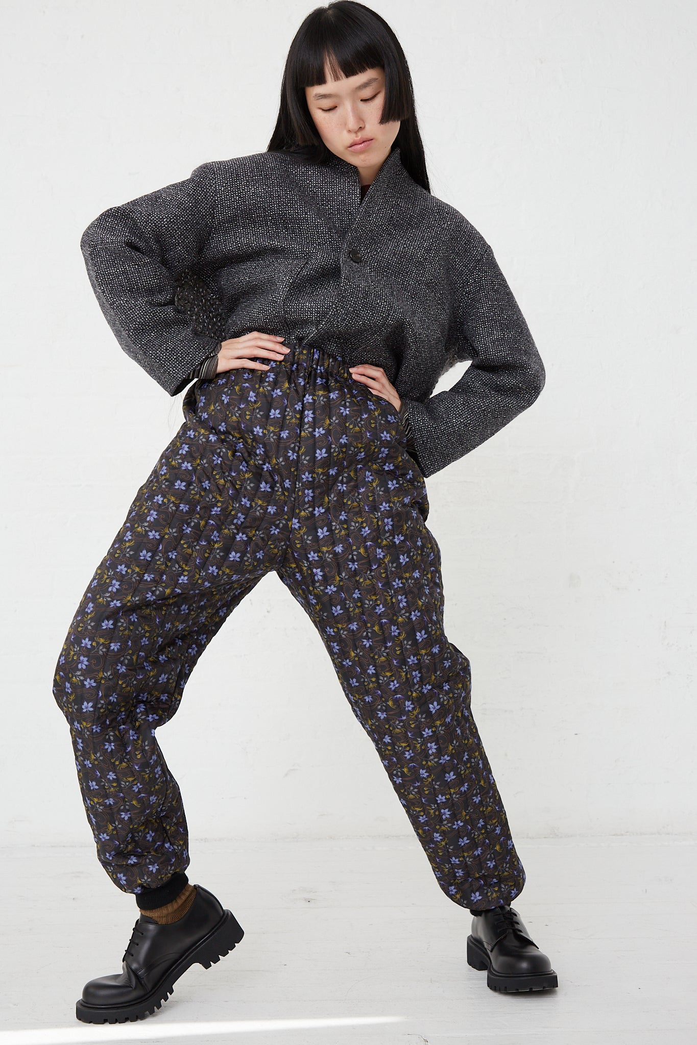 A woman wearing Bless Monpe Pant No. 08 in Floral Print A - S with an elasticated waist.