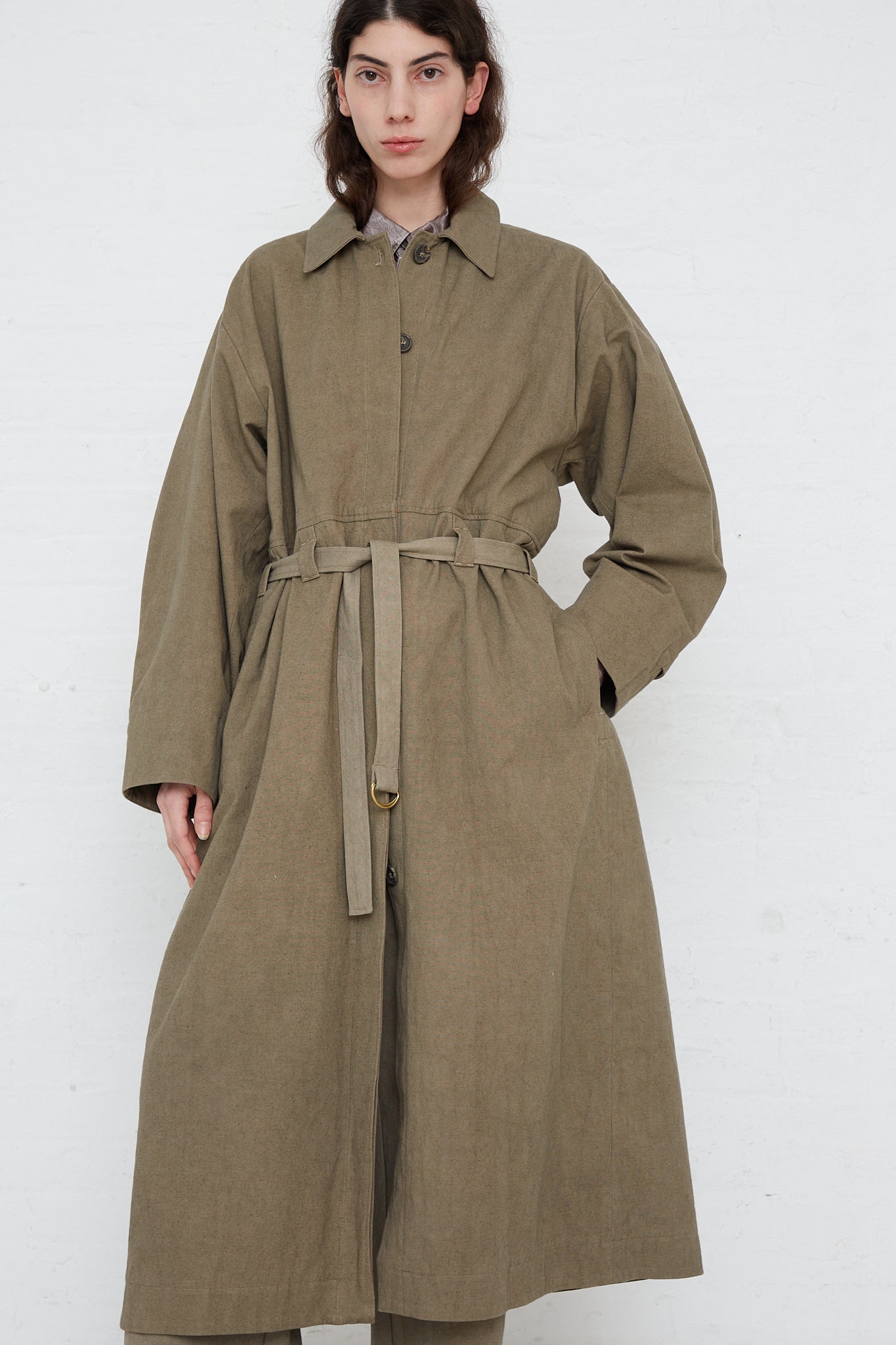 An oversized Lauren Manoogian Belted Trench in Fatigue made of soft canvas with adjustable cuffs.