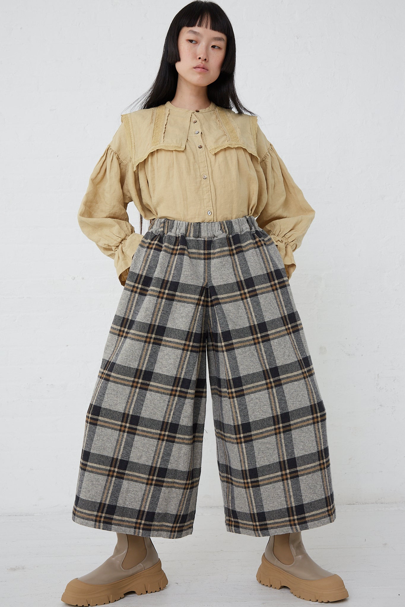 The model is wearing Cotton Heavy Twill Plaid Wide Leg Pants in Navy made by nest Robe.