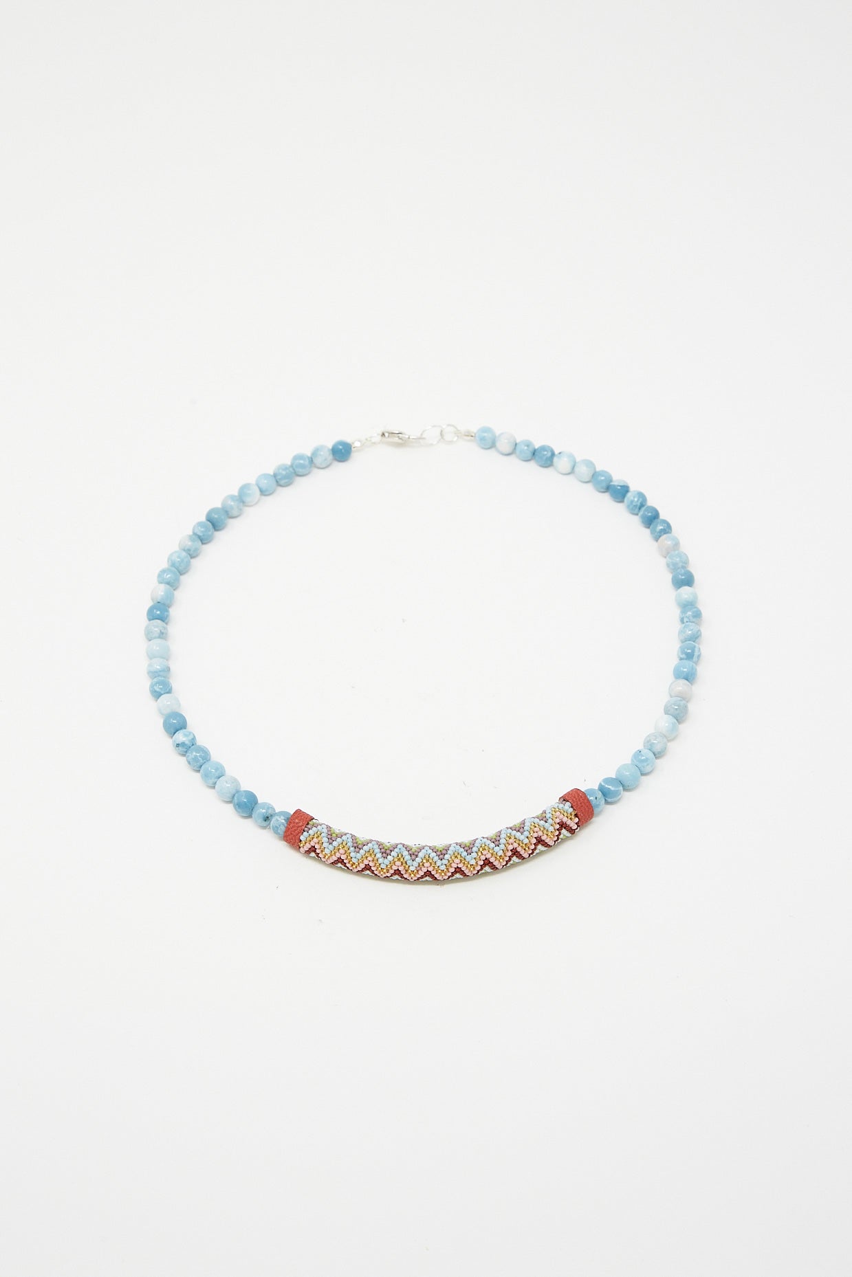 A Beaded Bar Necklace in Larimar with Robin Mollicone beads on a white background.