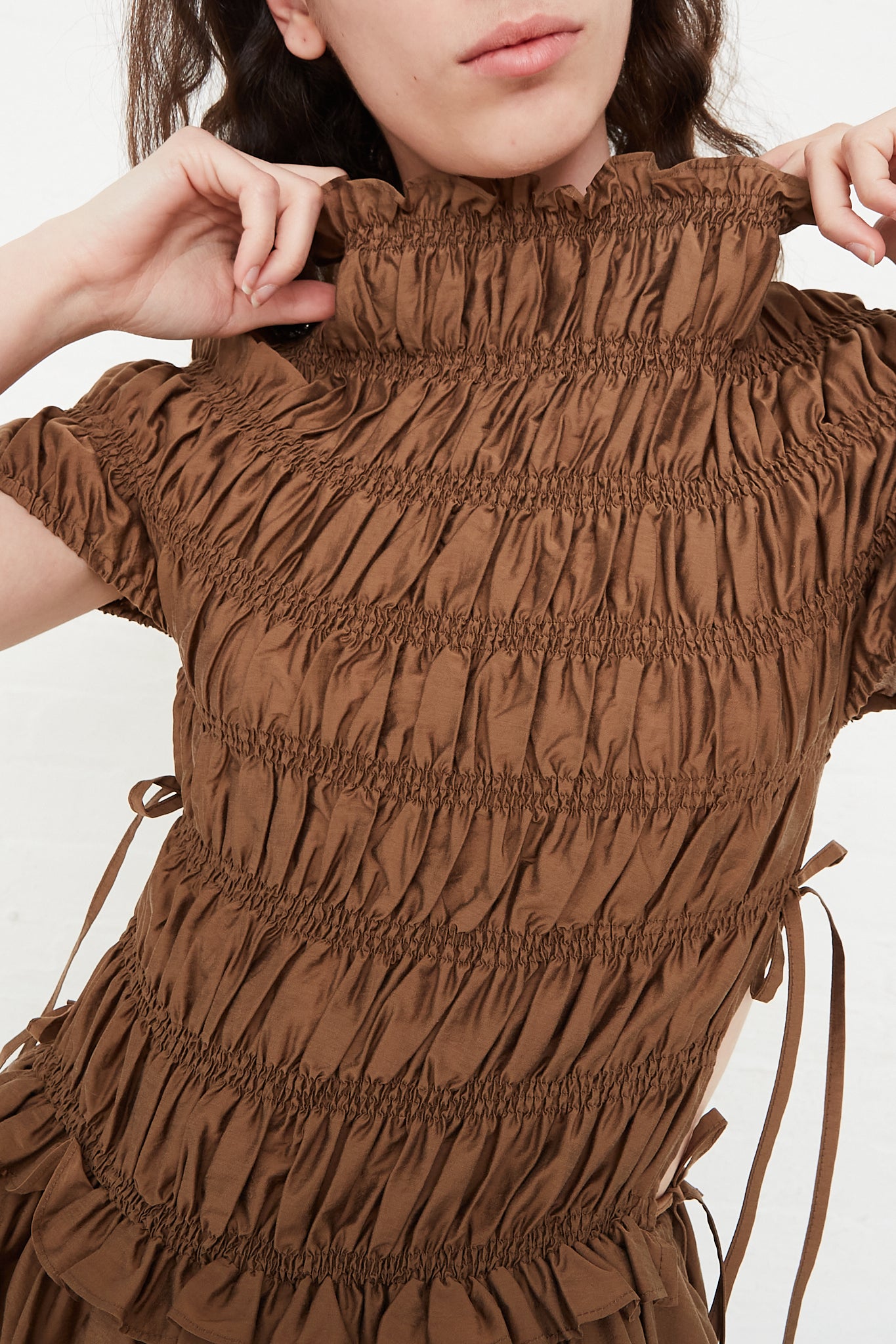 Cordera Sculpted Dress in Tigers Eye bodice smocking detail