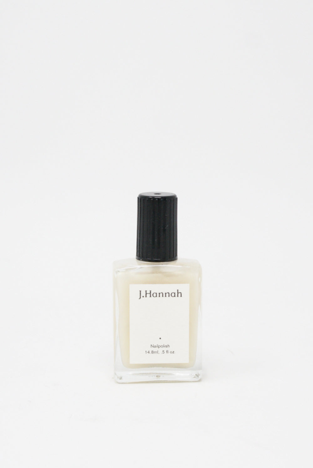A small bottle of Akoya nail polish by J Hannah on a white background.