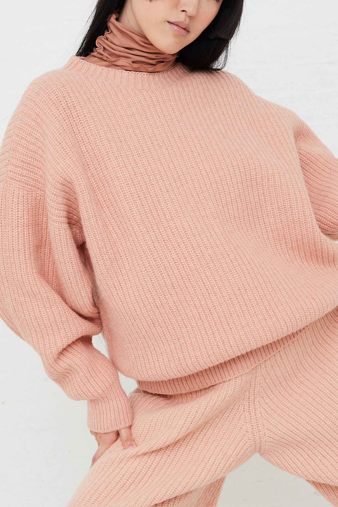 Mea Crew Neck Pullover Sweater in Pink by Baserange for Oroboro Front Upclose