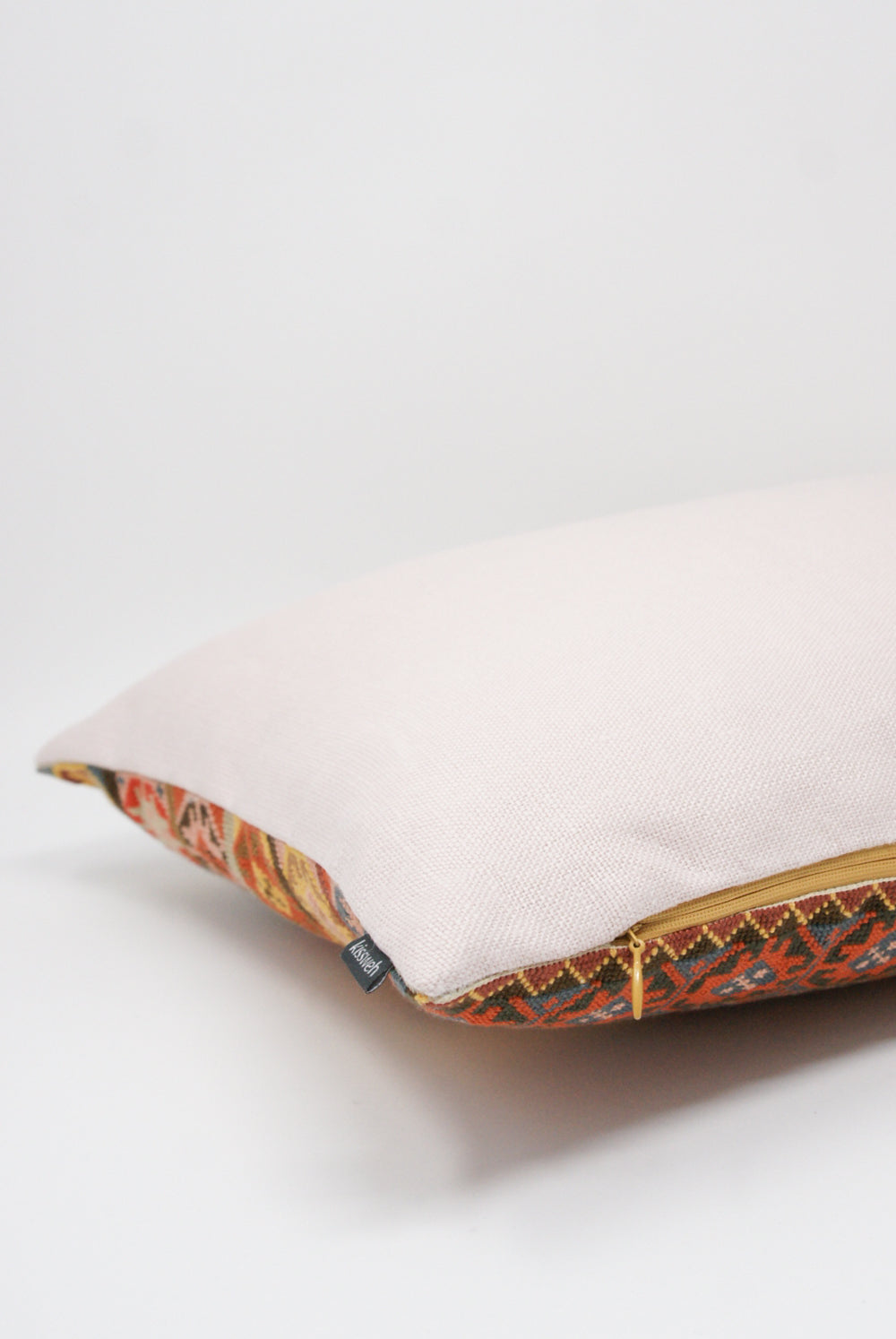 Kissweh Wafa'a Hand Embroidered Pillow in Autumn A zipper detail