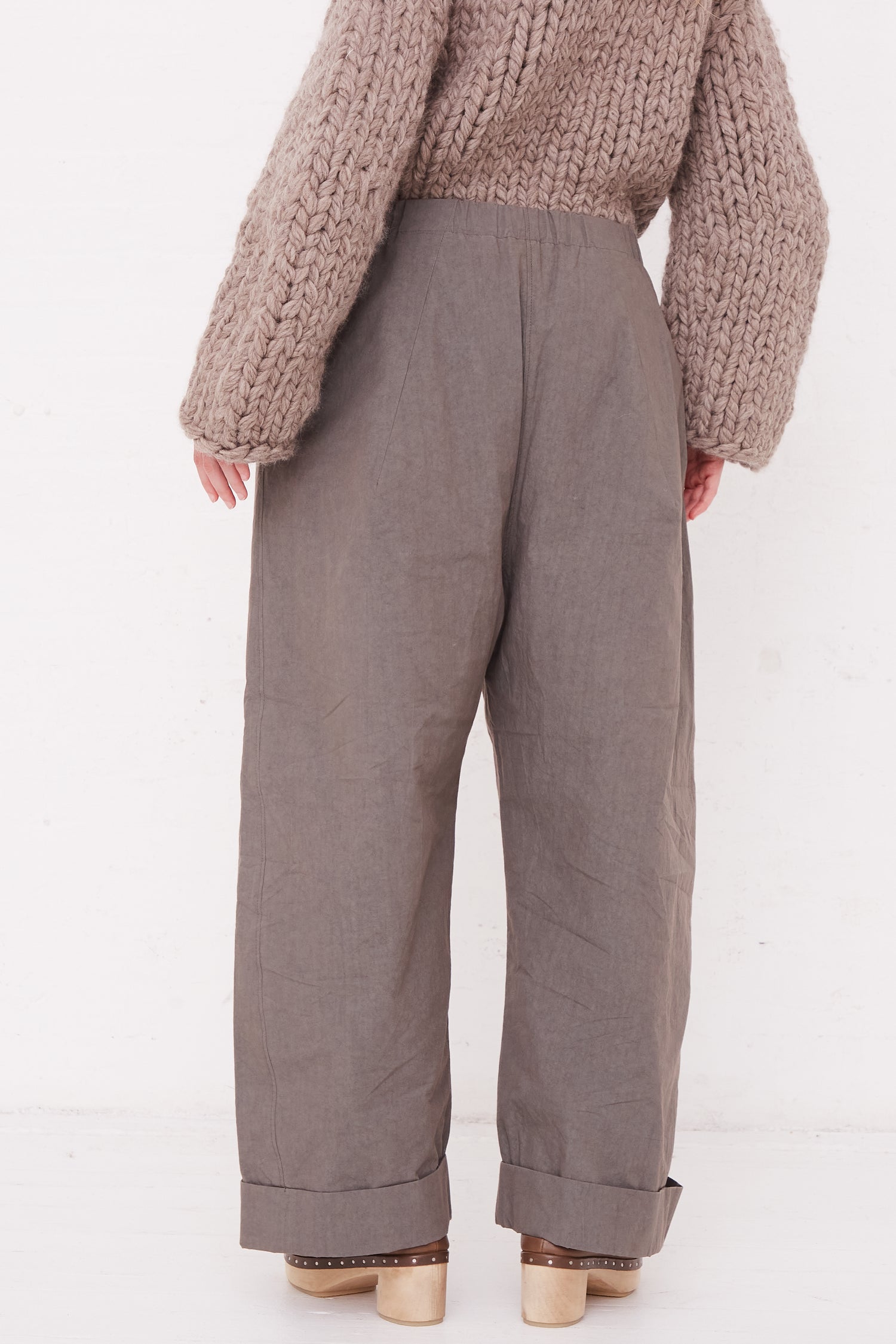 The back view of a woman wearing Lauren Manoogian's Duvet Pant in Lead.