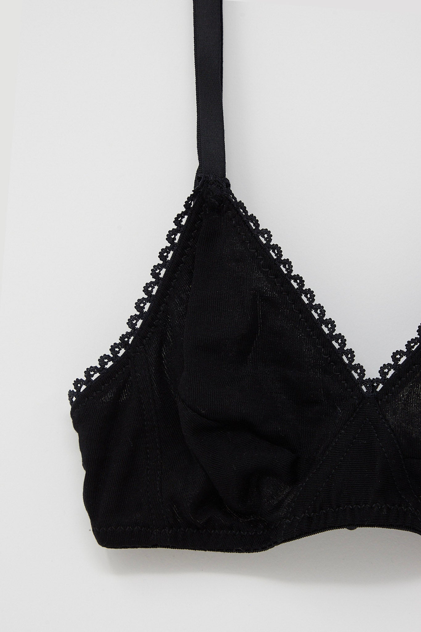 An Araks Antonia Bralette in Black with lace trim.