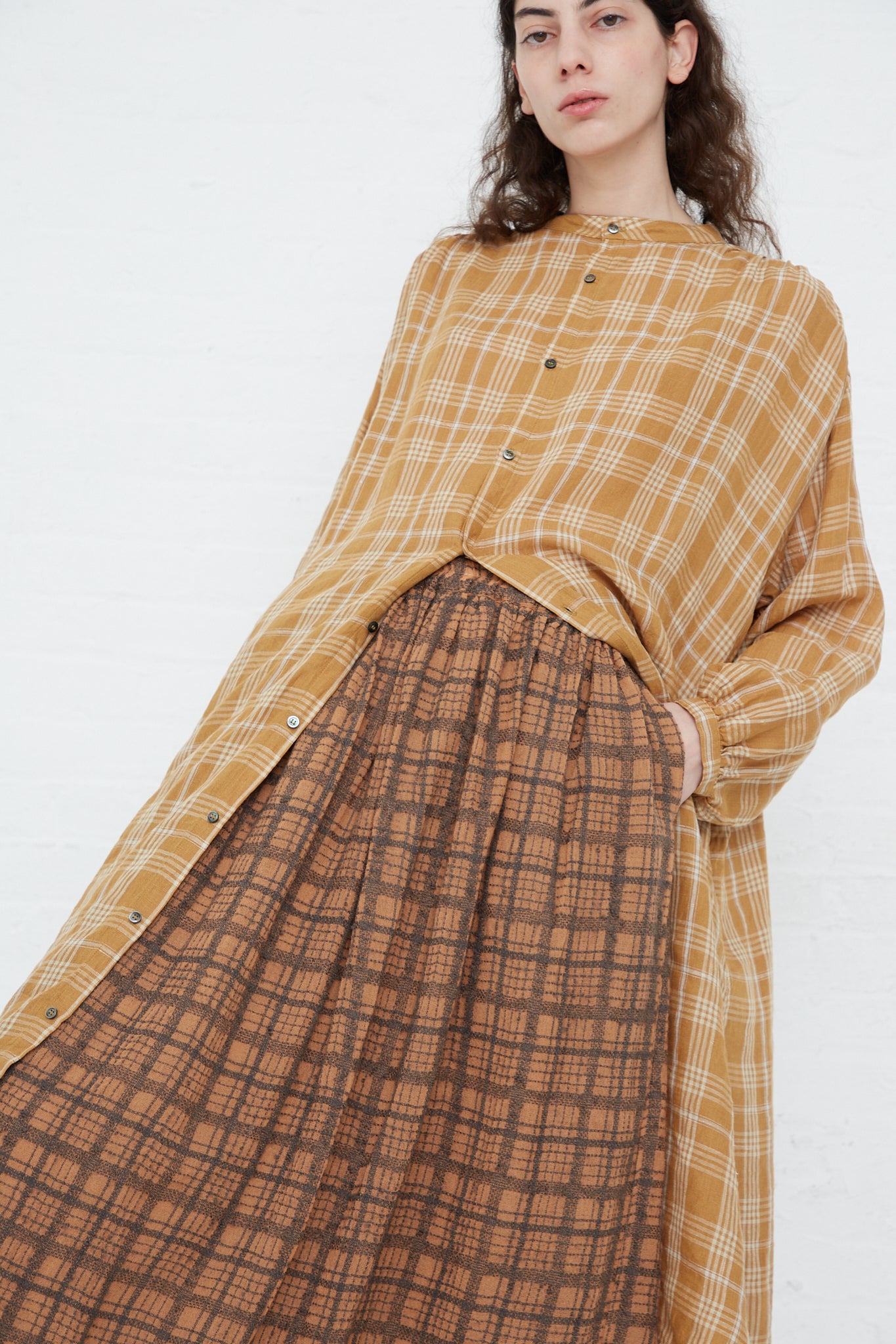 A model wearing the Linen Check Dress in Camel by Ichi Antiquités with relaxed fit.