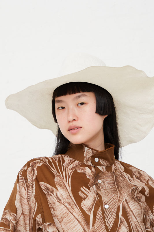 Reinhard Plank - Nana Flower Viscose Hat in White full front view on model.
