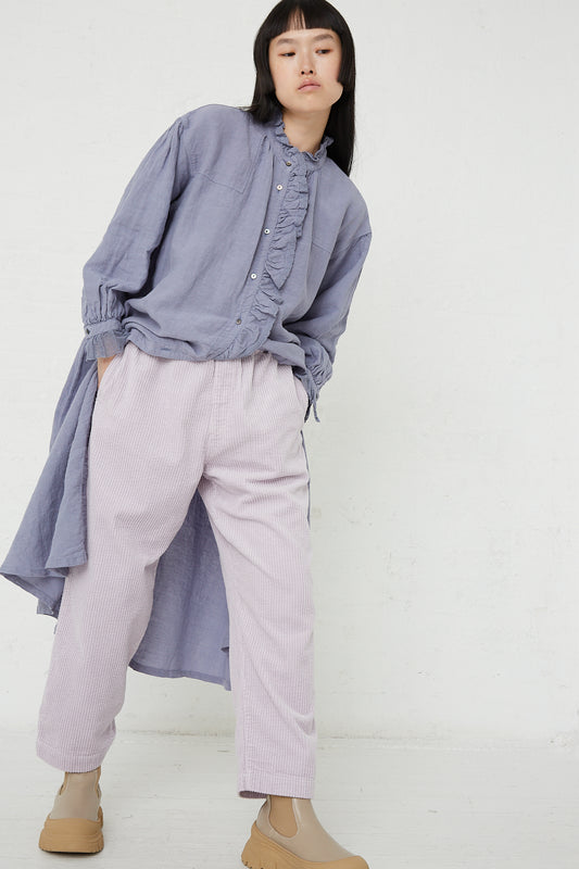 A model wearing nest Robe Cotton Corduroy Easy Pant in Lavender.