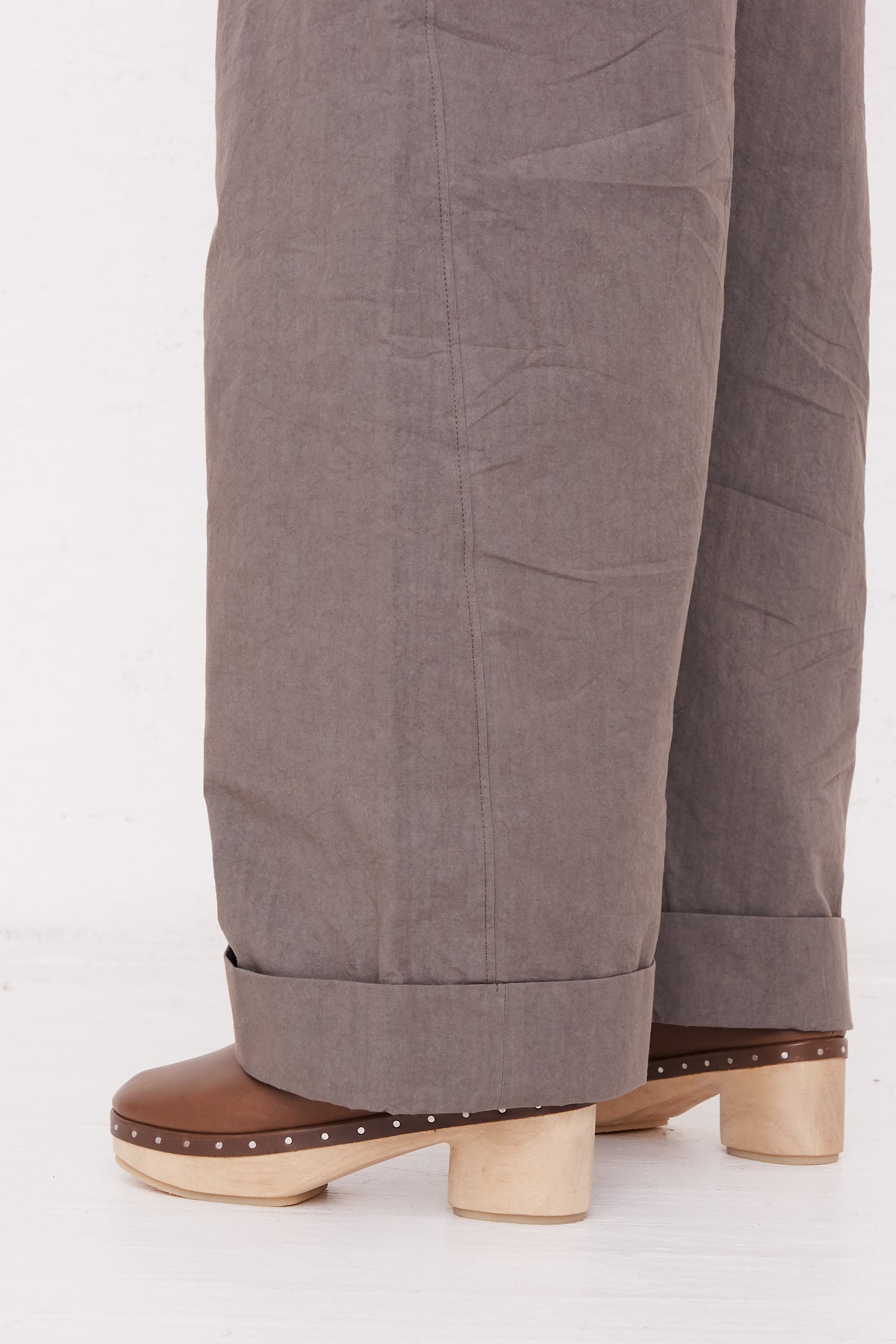 A woman wearing an oversized pair of Lauren Manoogian Duvet Pant in Lead.