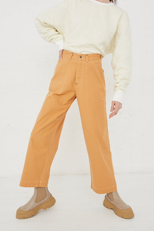 CHIMALA Cotton Canvas Work Pant in Apricot - Oroboro Store | Front view and full-length highlighting pants, crew top and boots