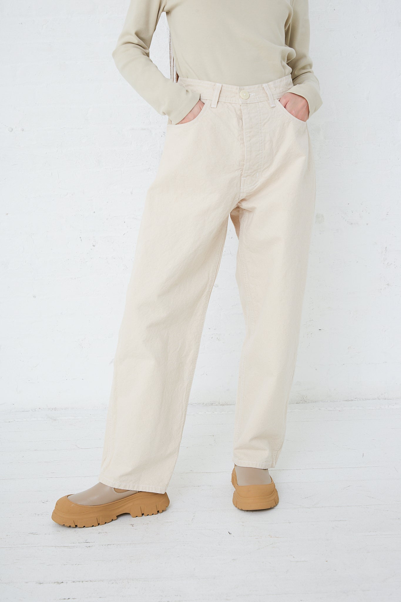 A woman wearing Jesse Kamm's Organic Canvas California Wide pants in Natural.