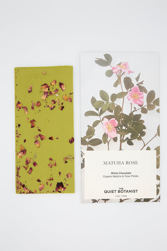 An organic Matcha Rose Chocolate Bar with a green cover and a pink cover from The Quiet Botanist.