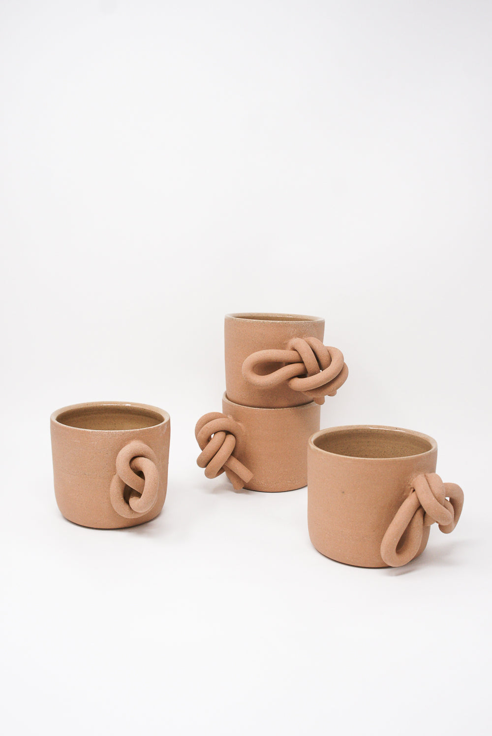 Lost Quarry - Single Knot Mug in Terracotta group view