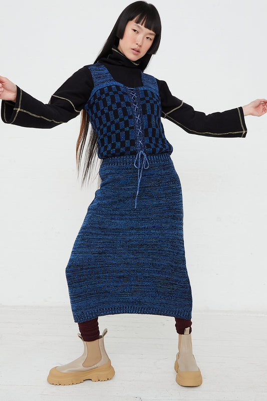 A model wearing an Intensity Optic Dress in Blue in NYC.