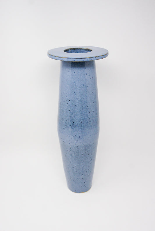Keywords: Tall Tube Saucer in Mottled Blue vase.
Product Name: BZIPPY brand.