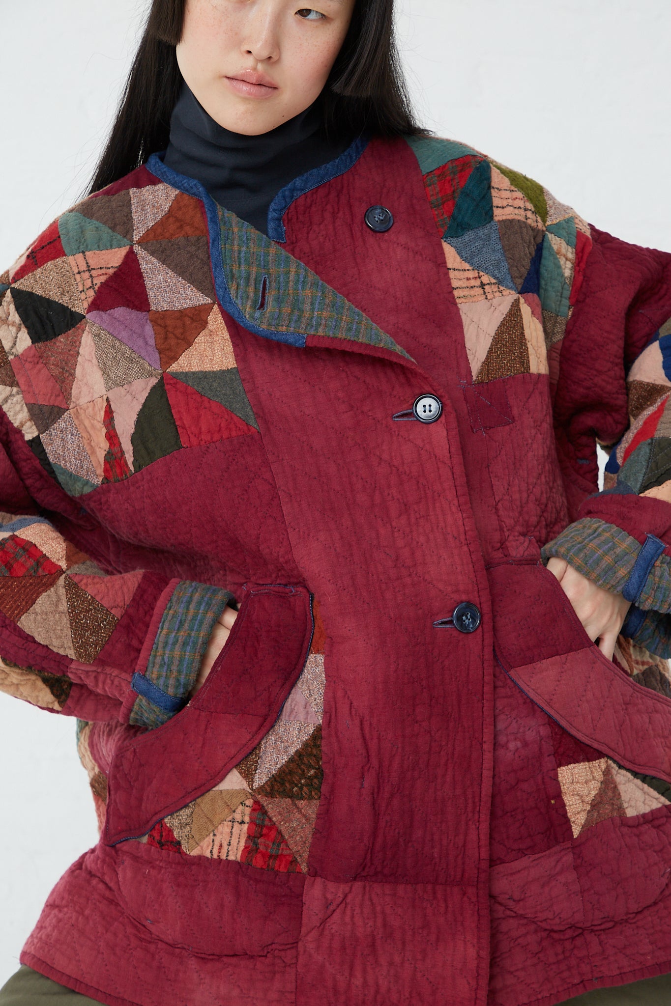 A woman wearing a As Ever Quilt Jacket in Mulberry.