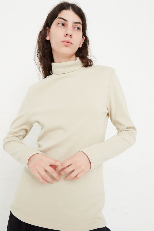 Organic Cotton Rib Knit Turtleneck Top in Ivory by Black Crane for Oroboro Front
