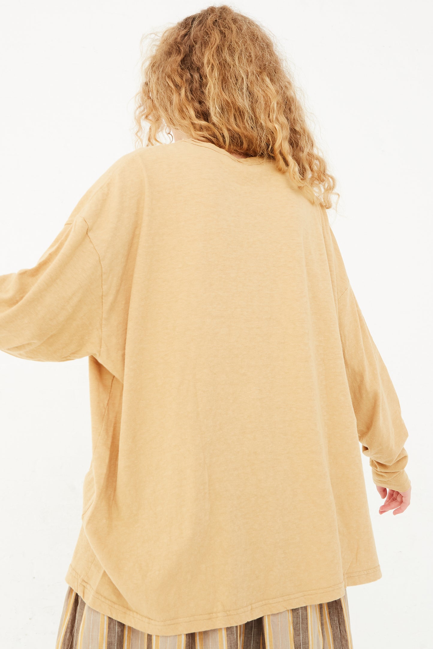 The back of a model wearing a Ichi Antiquités Cotton Loose Pullover in Camel, available at Oroboro store in NYC.