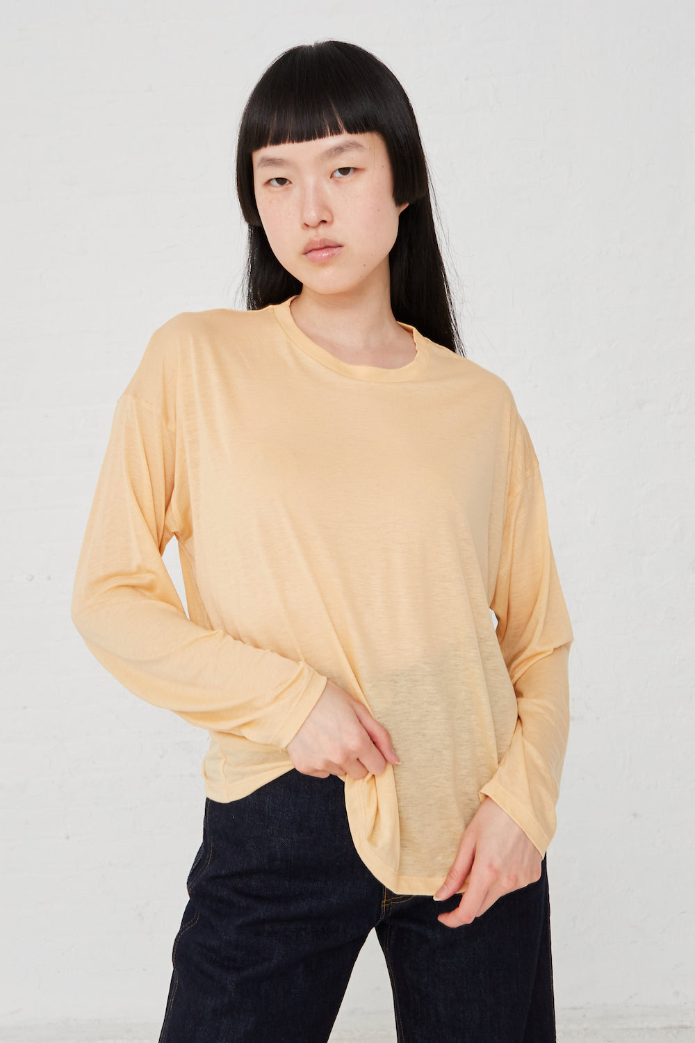 Baserange - Loose Long Sleeve Tee in Daf Yellow full front view on model.