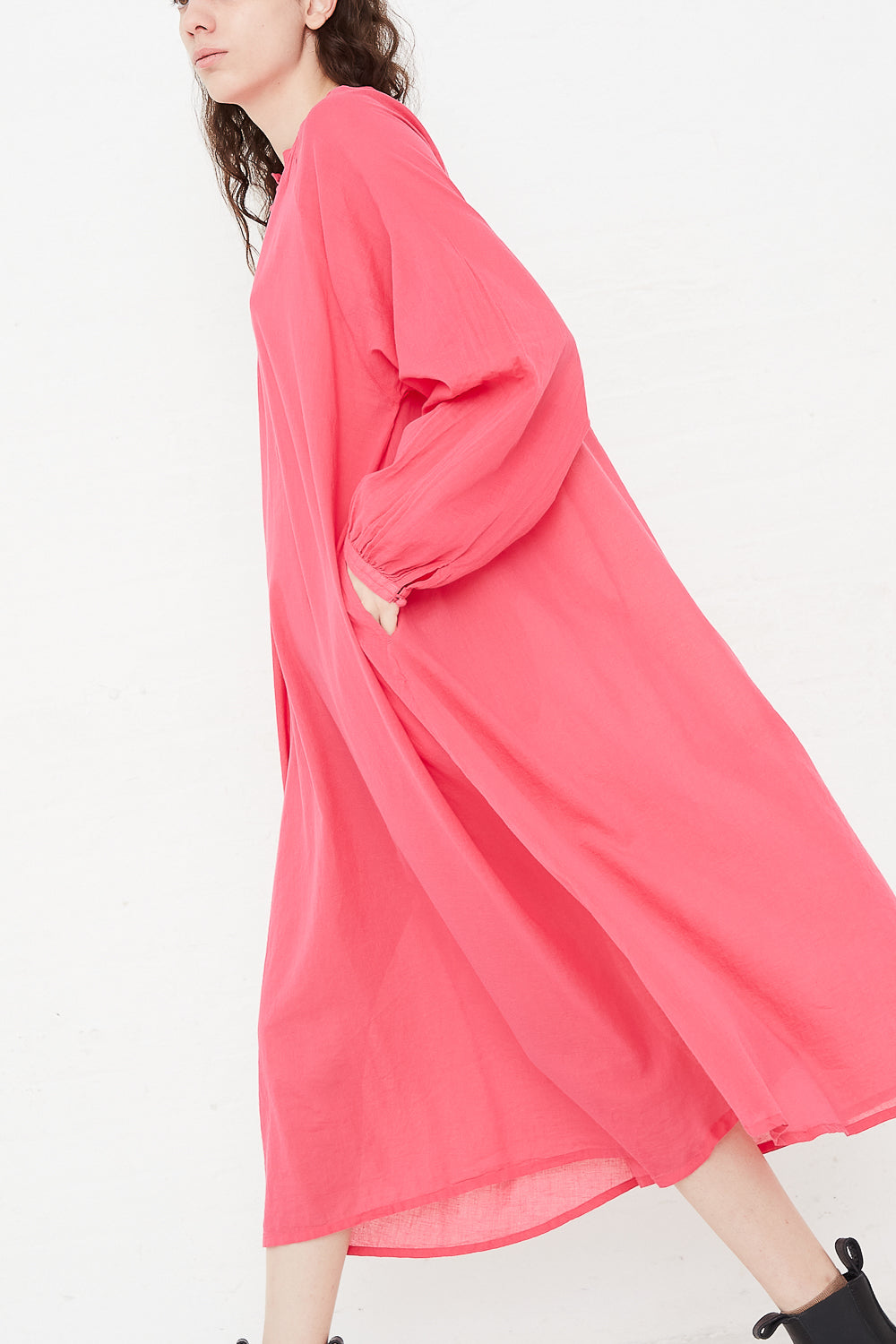 Dress in Pink side view with hand in pocket