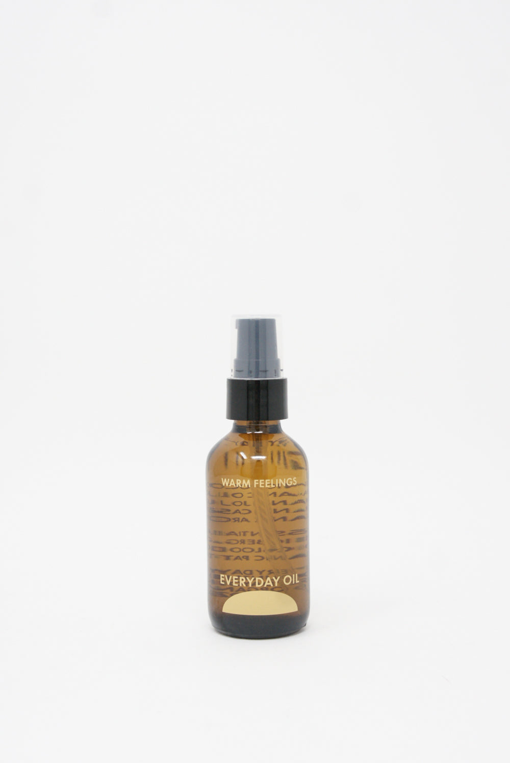 A small bottle of Everyday Oil Warm Feelings - 2 oz by Everyday Oil on a white background.
