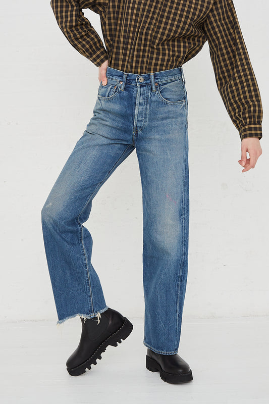 CHIMALA Selvedge Denim Straight Cut in Medium Rinse - Oroboro Store | Front view and full length. Model's hand on hip. 
