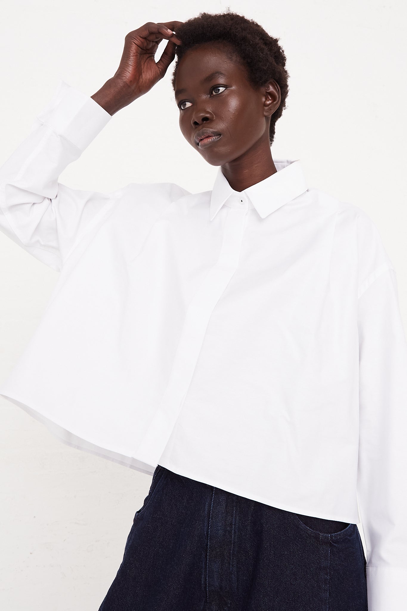 CORDERA Long Sleeve Shirt in White | Oroboro Store | Front view of shirt upclose on model
