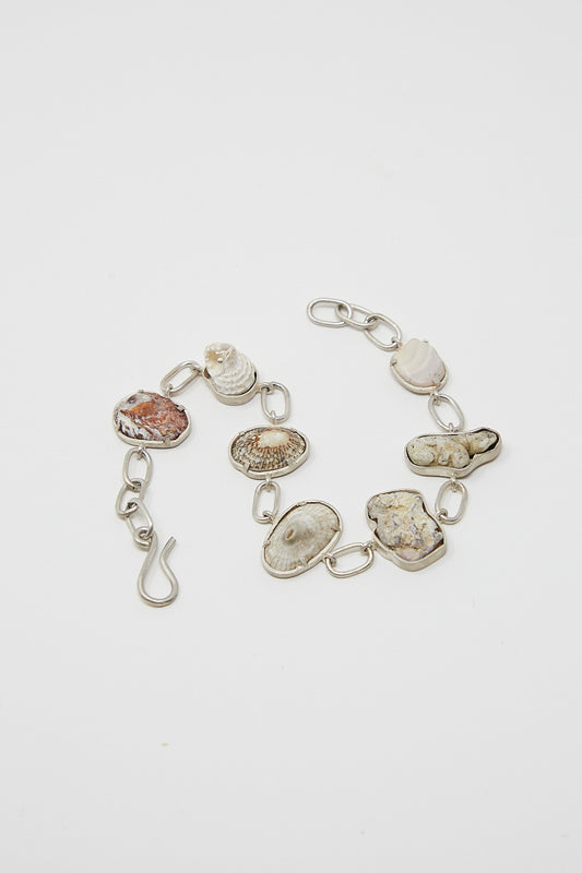 A La Ma r Sterling Silver Bracelet 001 B adorned with found shells and sterling silver stones.