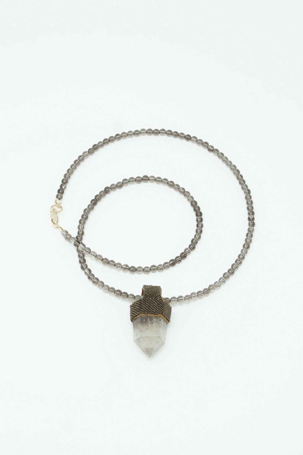 A Robin Mollicone Long Pendulum Necklace in Smoky Quartz Beads Brown, Citrine Crystal and a silver chain.