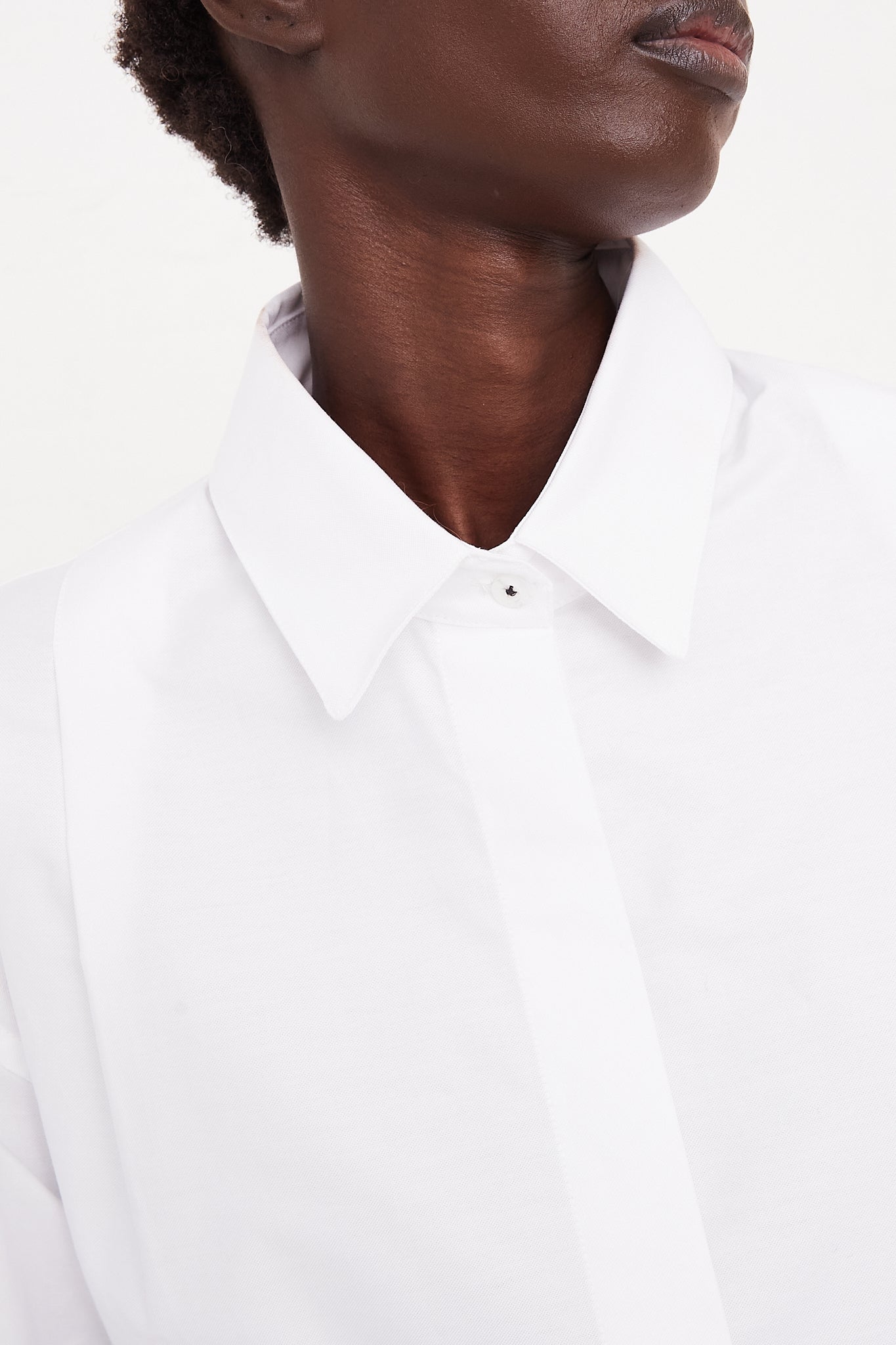 CORDERA Long Sleeve Shirt in White | Oroboro Store | Front view upclose view of collar on model