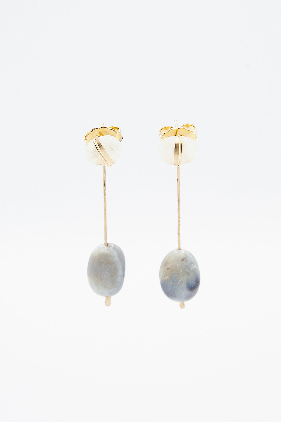 A pair of Mary MacGill Sculpture Earrings in Cottonwood II with blue and white beads.