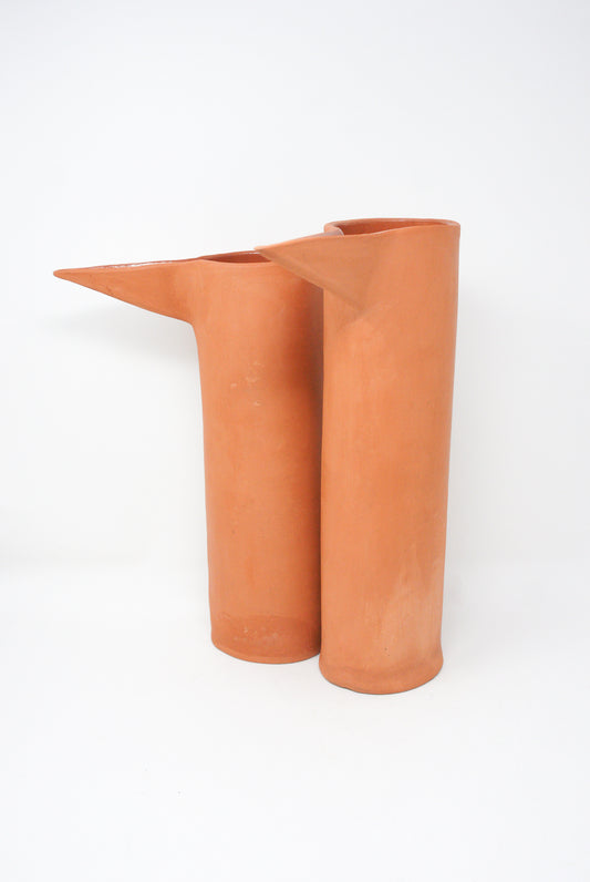 A modern handmade Beaker in Terracotta II pitcher with a dual-spout design by Paula Greif.