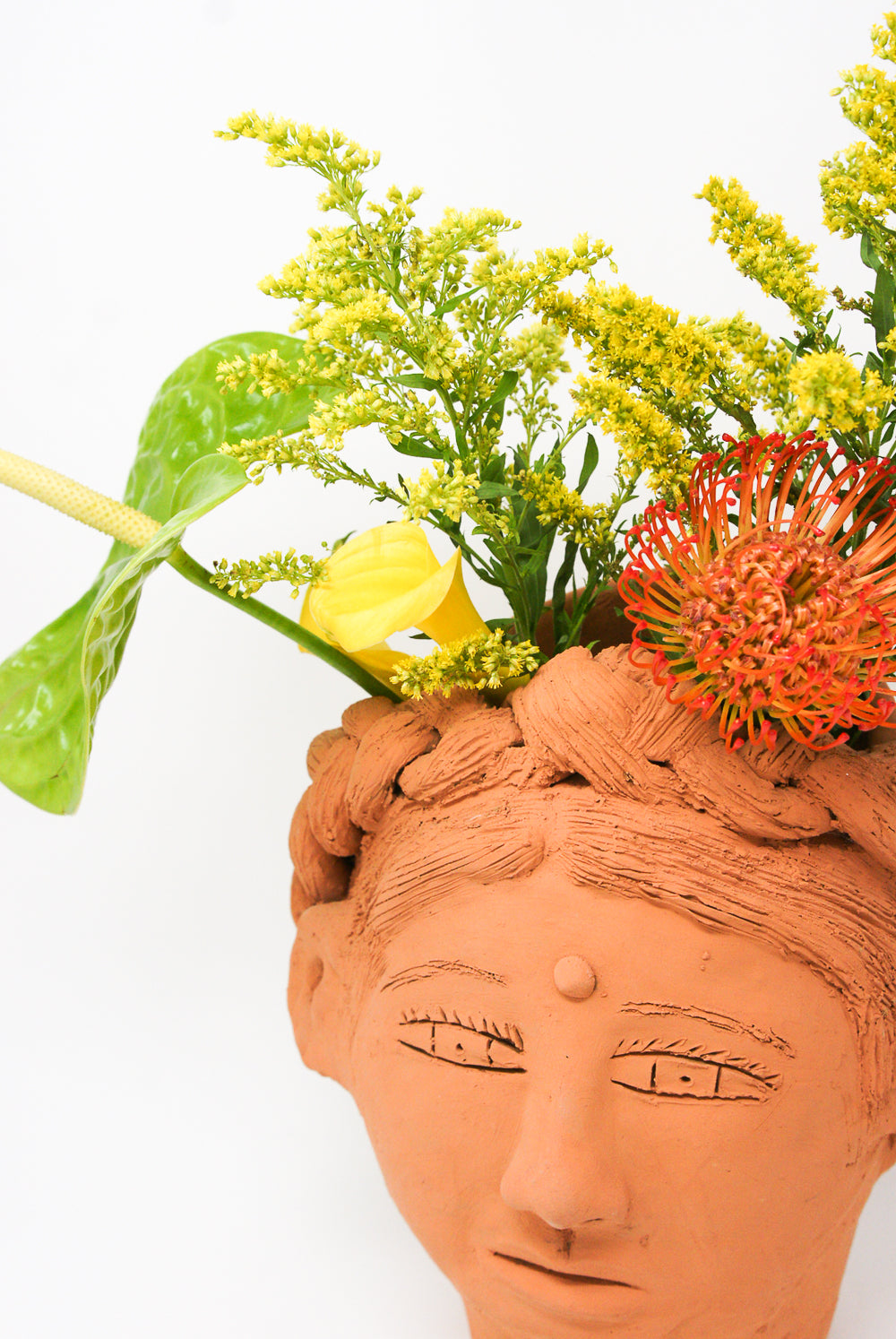 Large Head Planter in Terracotta detail with flowers