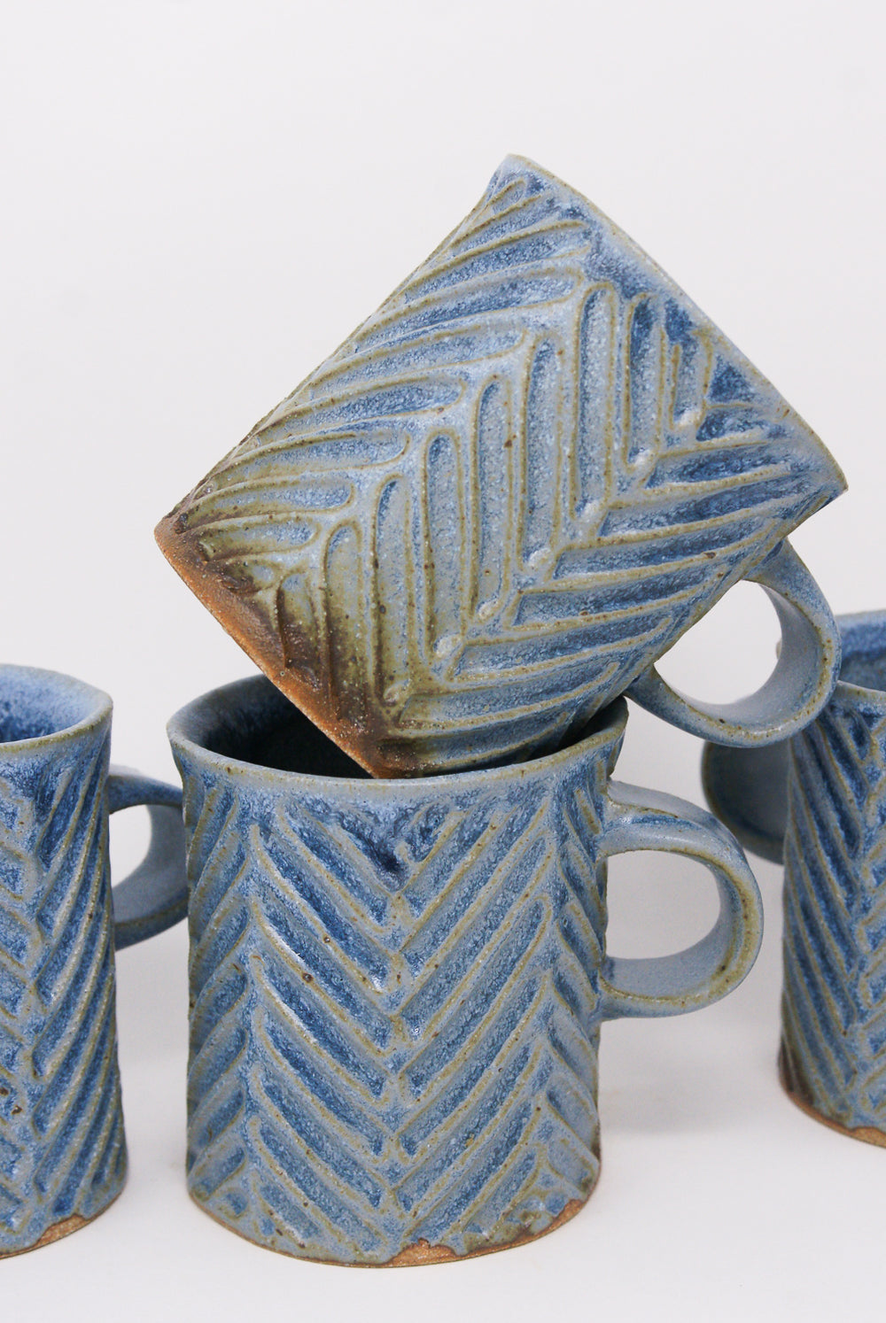 Mt. Washington Hand Built Chevron Carved Mug in Blue chevron detail
