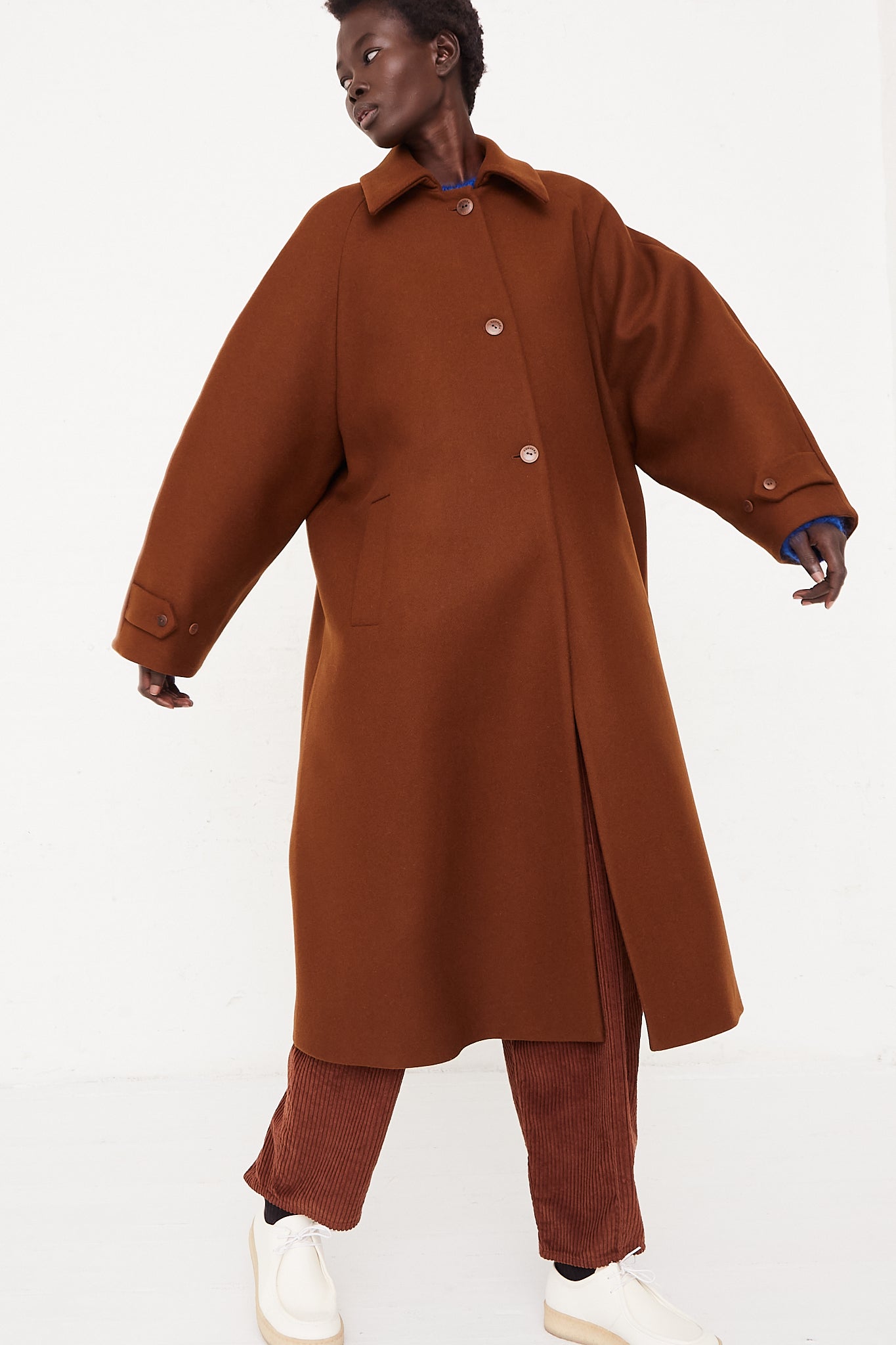 CORDERA Wool Coat Camel | Oroboro Store | Front image of coat buttoned closed full length on model