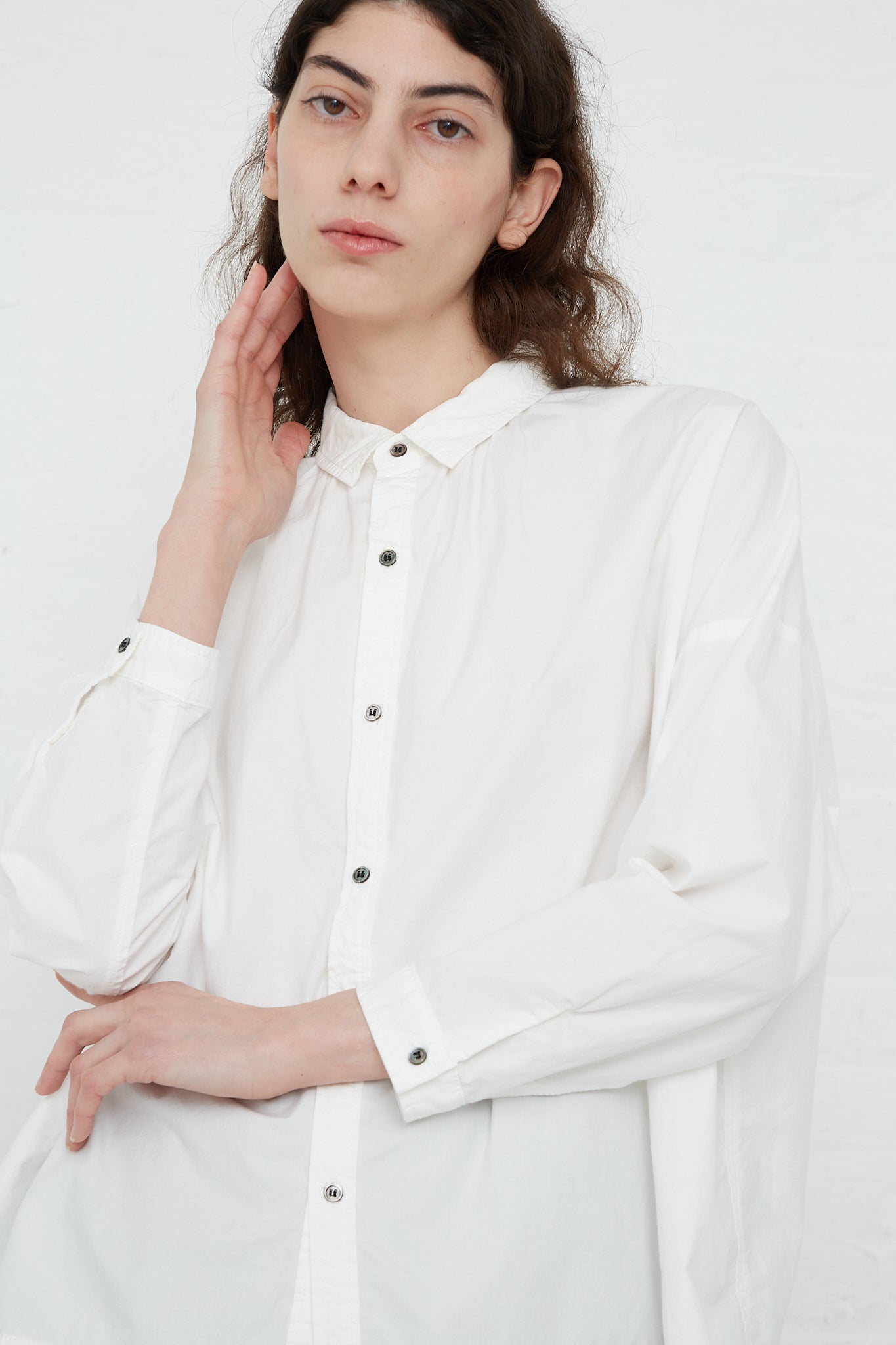 The model is wearing an Ichi Antiquités Woven Cotton Oumisarashi Shirt in White.