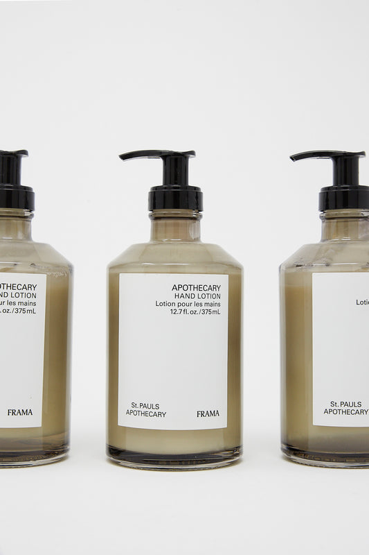 Three bottles of Frama Hand Lotion in Apothecary 375ml on a white background.