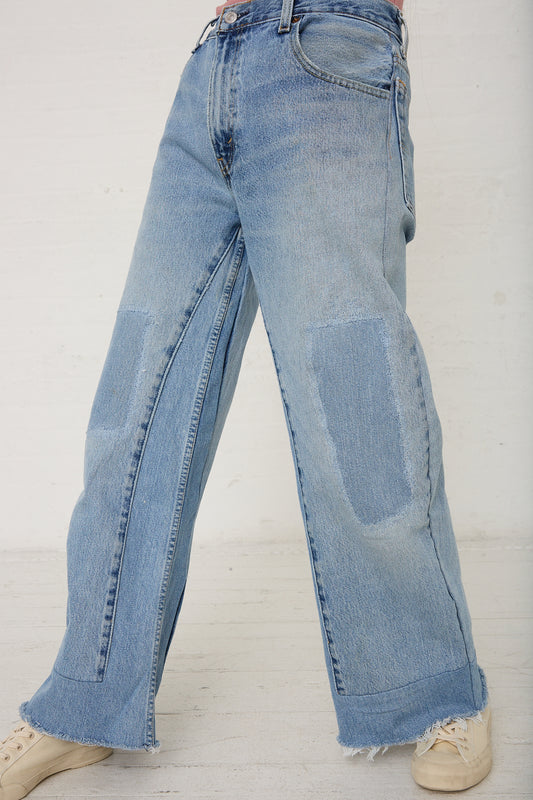 A woman is wearing a pair of B Sides' Reworked Culotte in Vintage Indigo. Front view and up close.