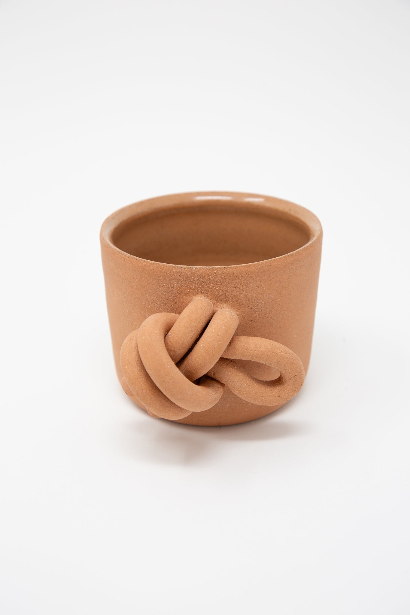 A Lost Quarry mug in Single Knot with Ends. Side view.