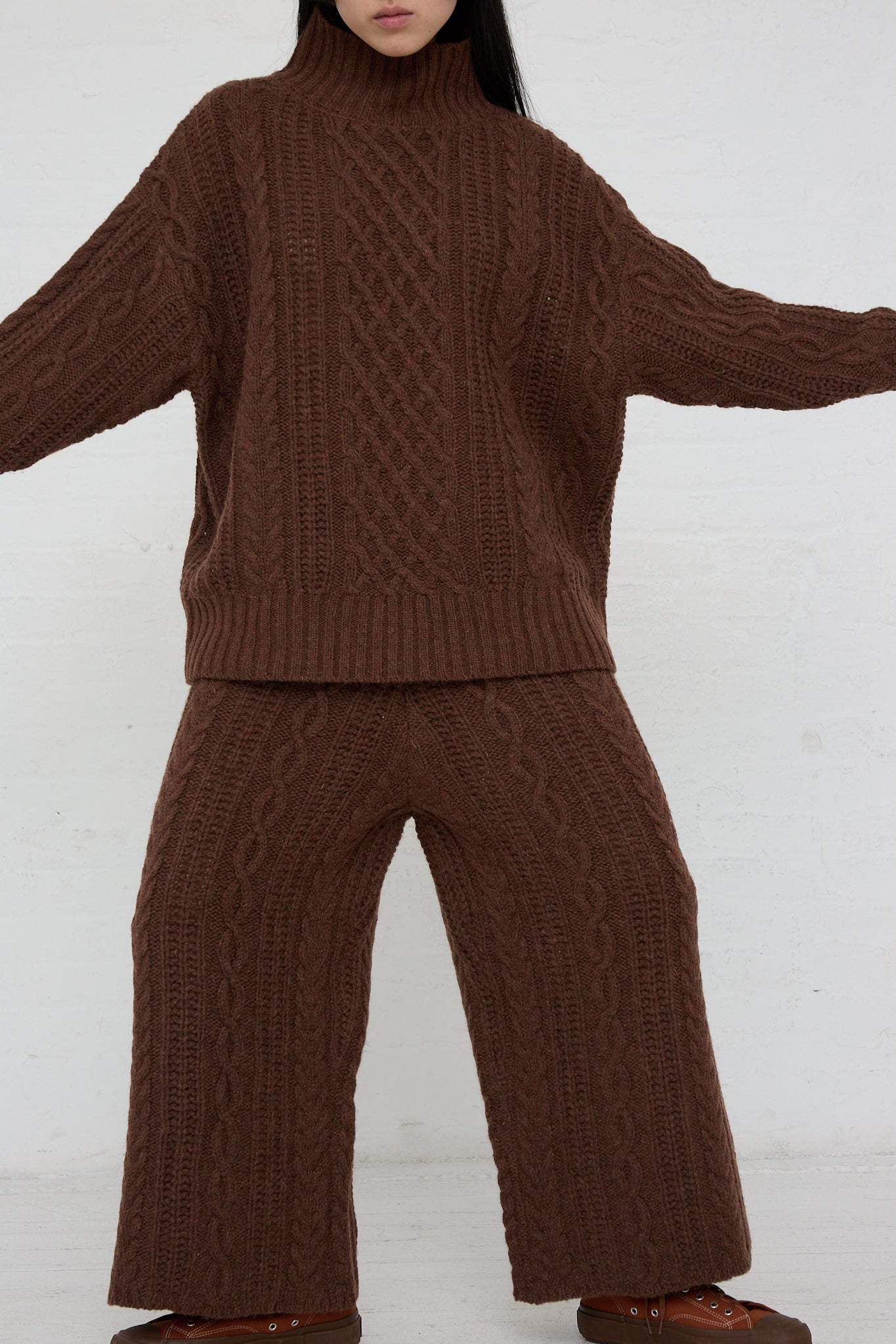 A woman wearing Ichi's Knit Pant in Brown. Full-length front view.