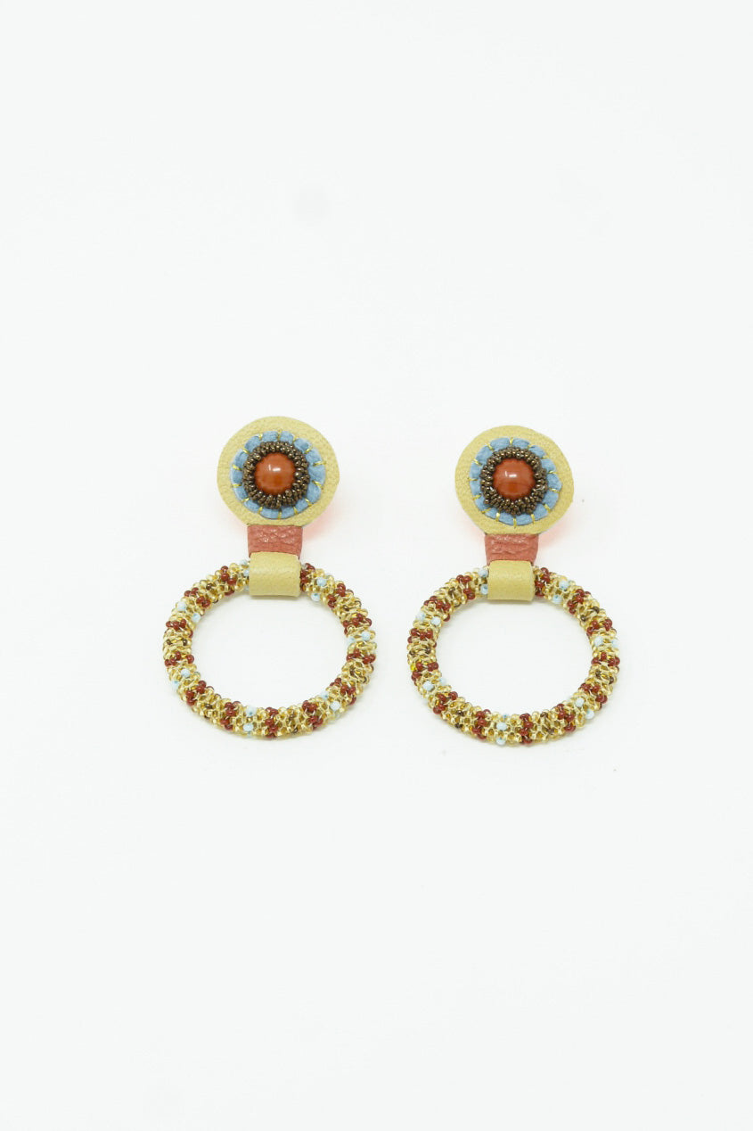 Robin Mollicone's Small Beaded Hoops in Red Jasper Tops, hand-stitched leather hoop earrings with Red Jasper stones on a white background.