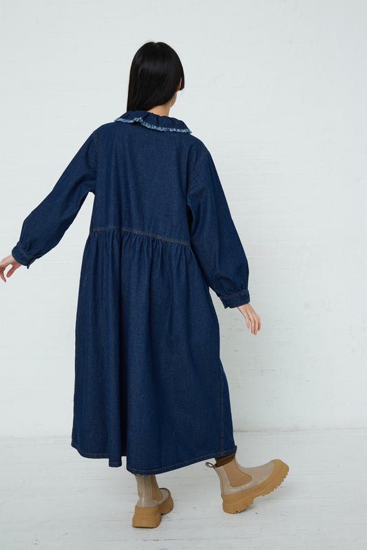 The back of a woman wearing an Ichi Cotton Collar Dress in Dark Indigo. Available at Oroboro Store.