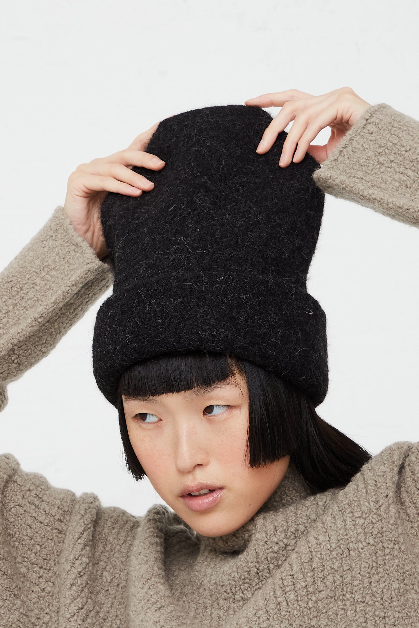 Alpaca Knit Carpenter Hat in Black Melange by Lauren Manoogian for Oroboro Side Upclose