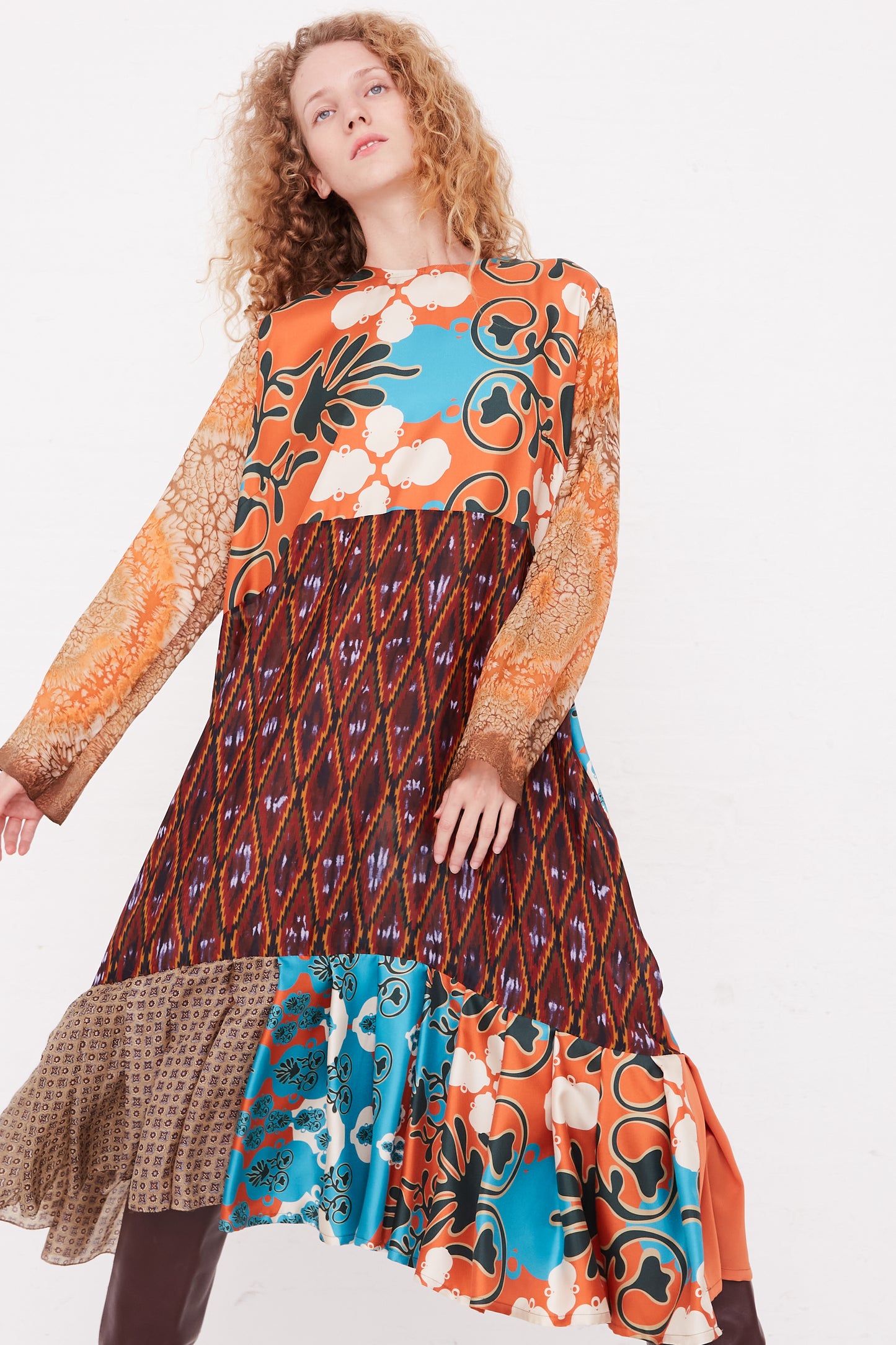 A model wearing a Bettina Bakdal Silk Vintage Scarves Lena Hannah Dress - M.
